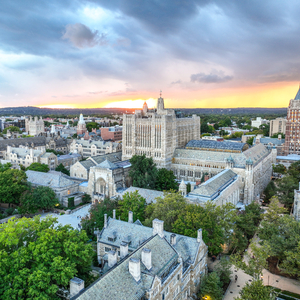Sprawling aerial view of Central Campus's gothic architecture at sunset