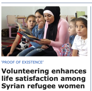 Syrian refugee woman reads to children